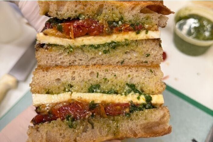 Giardina Sandwich - classic pesto, mozzarella, confit tomatoes, balsamic glaze, homemade focaccia